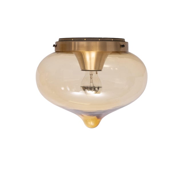 Unique set of three smoked Glass drop pendant lamps. One larger One. Space Ace. Amber Color. Aluminum bracket. Signed...