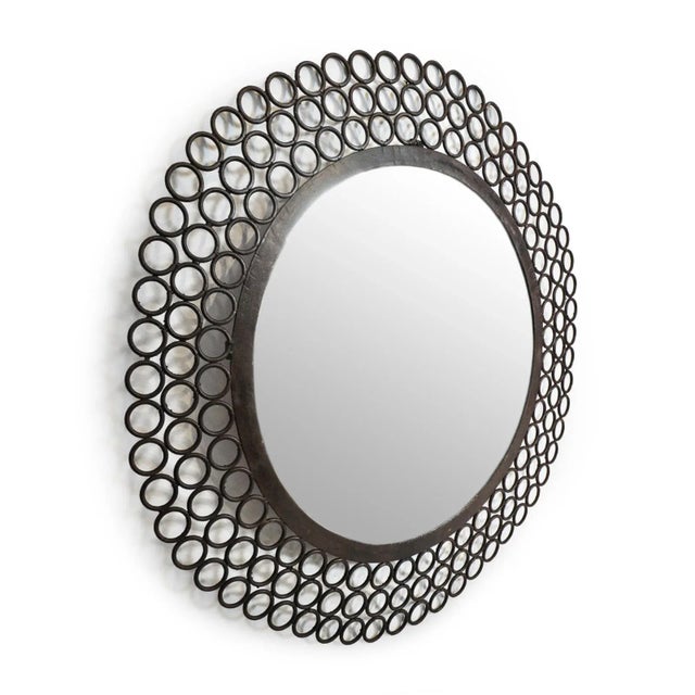 Vintage round iron ring mirror frame with beautiful hand waxed patina. Solid and sturdy handmade quality with unique...