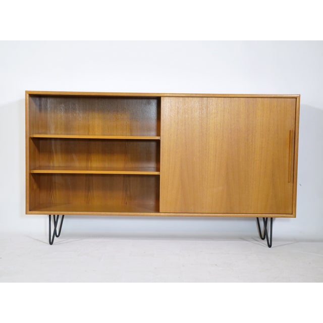 Stylish sliding-door sideboard from WK Möbel. Design: Georg Satink Width: 165 cm Height: 95 cm Depth: 33 cm I have...