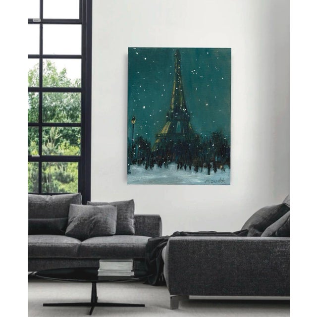 "Paris in the Snow" Giclee print on stretched canvas expresses the beauty of the Eiffel Tower in the winter snow. The...