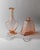 This vintage Murano glass decanter set from 1940s Italy includes two sculptural pieces in Rosalin art glass, each with a...