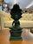 Ancient Khmer's most venerated icon is the Buddha seated on the throne-like coils of Muchalinda. This superbly cast bronze...