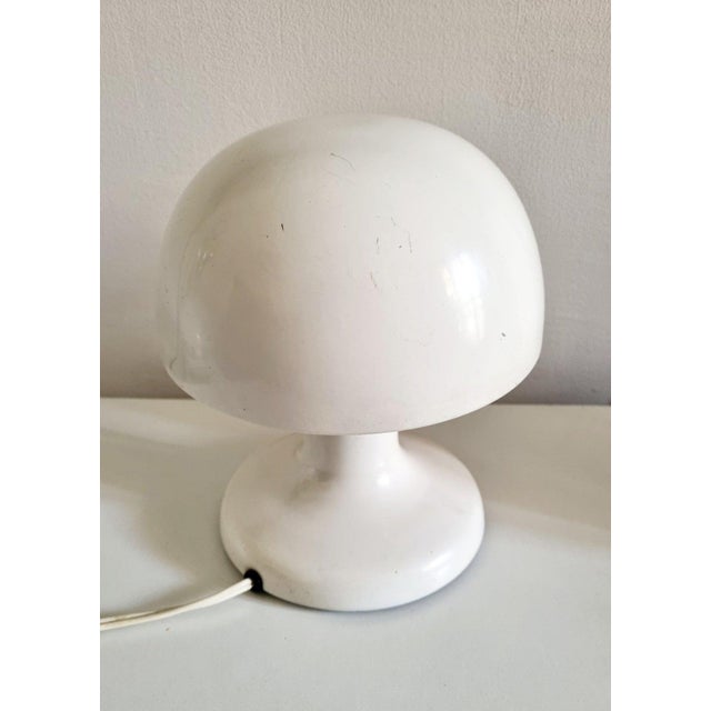 Italian Modern White Metal Table Lamp by Tobia and Afra Scarpa for Flos, 1970s, in Very Good conditions. Designed 1960 to...