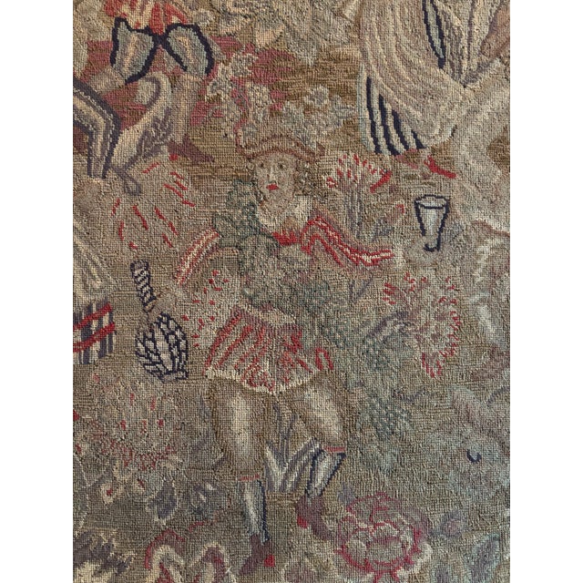 Early 19th century framed tapestry originally a fire screen, the tapestry features dancing and frolicking lords and ladies.