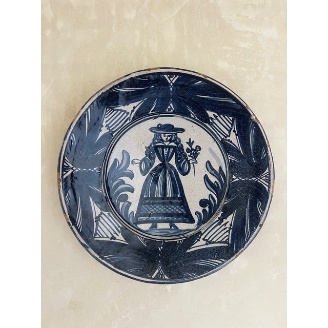 Large white and blue tin glazed dish in a style called La Corbata, made around 1900 in the Catalan region of Spain, North...