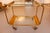Classic, elegant Art Deco bar cart in brass. France, 1930s. The bar cart has been professionally polished, as have the...