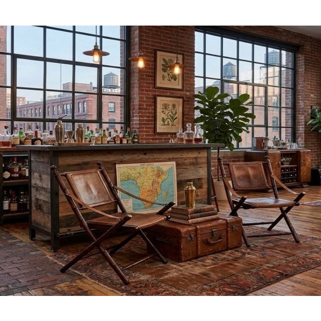 FRENCH Vintage safari-Campaign chairs in Elegant leather and BRASS details, lending to a masculine maximalist look....