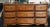 Henry Link Furniture Ornate and Partial Gilt Dresser with Wall Mirror plated by Lenoir. Measures 62" in width, 18" in...