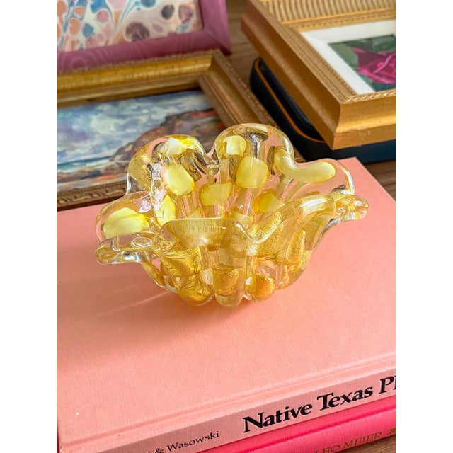 Beautiful 1950s vintage Murano hand blown fluted Italian art glass flower form bowl or ashtray with scalloped top in a...