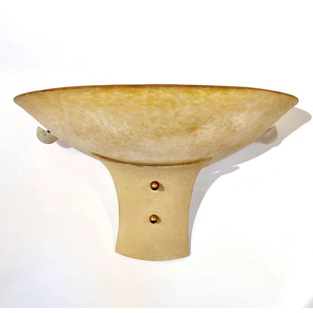 Antique Italian pair of Venetian wall lights, of the late Italian Art Deco period, in a gold amber Murano glass, worked...