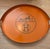 This vintage Hermès tole tray provides any space with a perfect pop of that famous orange. Painted with Hermès logo in the...