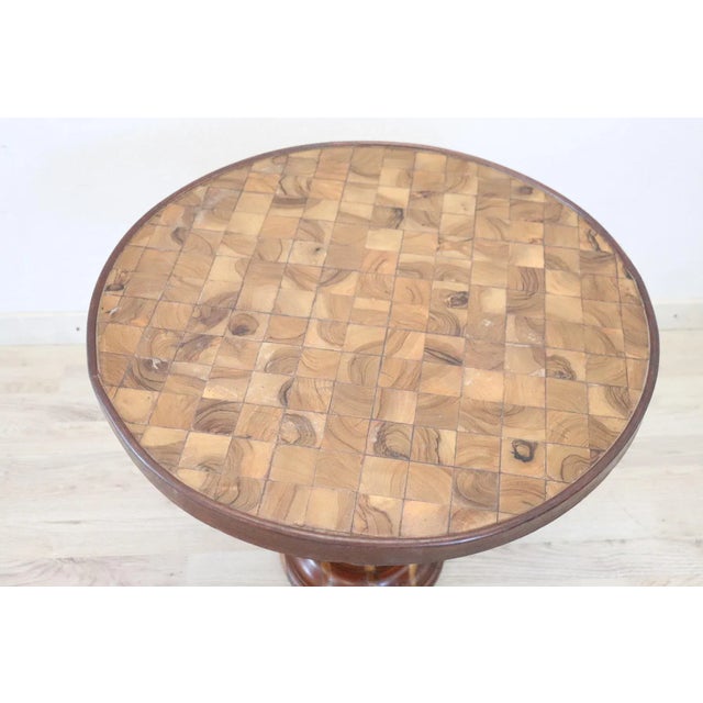 Rare and fine quality Italian 1930s oval side table in inlay marquetry olive wood. Finely turned central leg. Really...