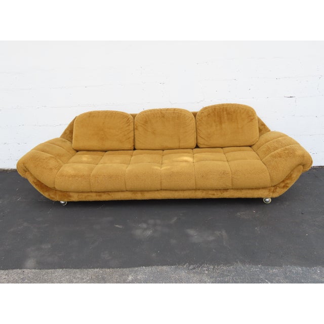 This beautiful Sofa is made out of wood, and upholstery. The sofa has Mid Century Design that was made around the 1970s,...