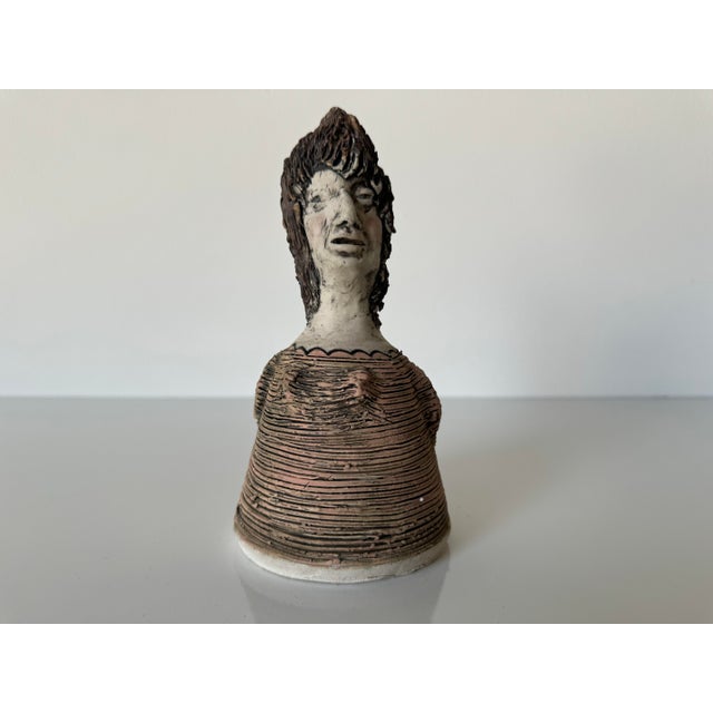 Vintage art handmade sculptural pottery bell in the shape of a female figure. Signed. C,1980's. Measures: 3.75" w x 3.75"...
