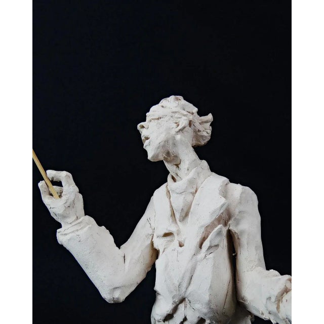 Contemporary terracotta conductor sculpture by Hélène Sellier Lovers of art and music sculptures, this sculpture by...