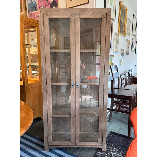 Design Plus Gallery presents a Reclaimed Wood + Glass Bookshelf. The style is similar to Restoration Hardware with its...