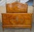 A French Maple bed frame, dating from the early 20th century, sourced in Provence, France. Richly crafted with dramatic...