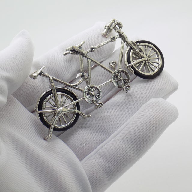 A vintage object depicting a miniature tandem bicycle, handcrafted in Arezzo, Italy between the 1980s and 1990s in...