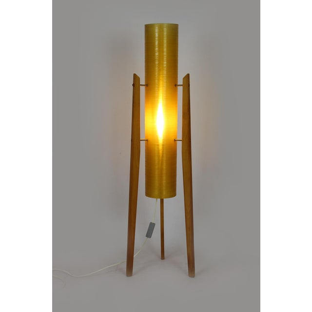This floor rocket lamp was produced in the 1960s in Czechoslovakia. It features yellow fiberglass shade on three wooden...