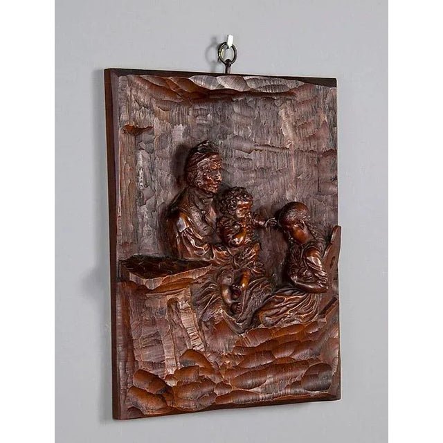 Relief Woodcarving by Hermann Steiner Meran 19th century The wooden carved relief shows a grandfather with grandson on his...