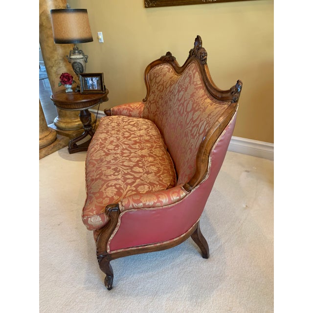 Beautiful Italian 18th century Settee upholstered by professional in antiques. Done in guilded silk with contrasting silk...
