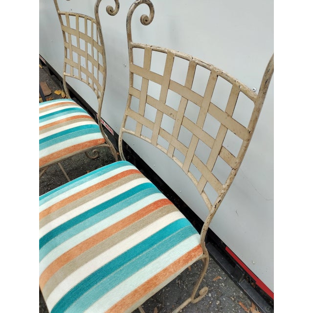 Set of 6 solid wrought iron dining chairs from Elden Collection manufactured in California. Each chair is made and...