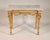 Period French neoclassical marble-top console table. Original gilt and marble. Lauren swags surround frieze of a laurel...