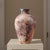 Substantial wheel-thrown studio pottery amphora urn vase featuring dramatic saggar and pit firing. Exhibits a burnished...