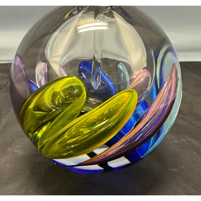 The Leon Applebaum Rainbow Perfume Bottle is a hand-blown glass piece with a colorful rainbow pattern, making it a unique...
