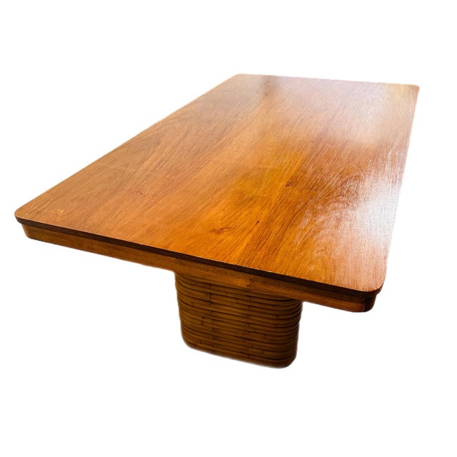 A classic 1940s tropical Mid-Century Modern mahogany top and double pedestal bamboo wrapped dining table in the style of...
