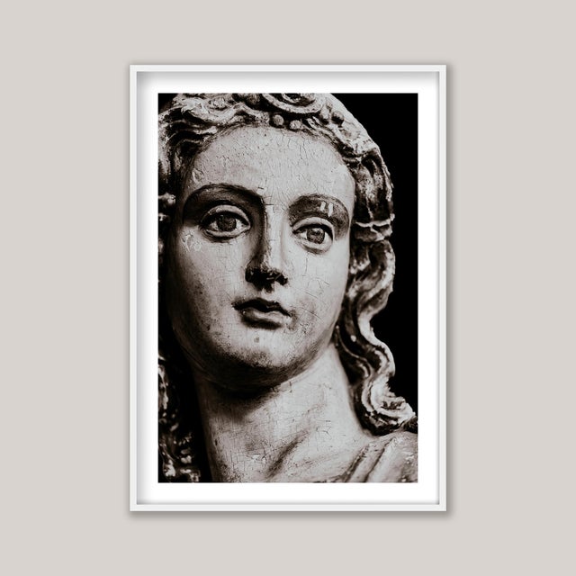 Anthropologie - Within a cathedral’s hush in Brittany, France, a wooden figure stands - carved, painted, serenely elegant...