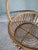 Wicker magazine basket with upper handle, belonging to the second half of the twentieth century.
