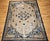 This beautiful 19th century Chinese Peking rug features a refined and balanced open field design set in a soft pale cream...