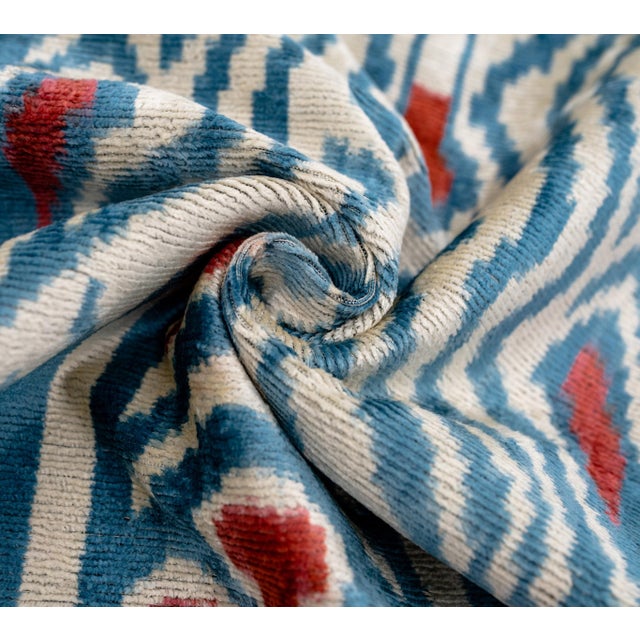 "Inspired by centuries-old textile traditions and reimagined for today's luxury interiors, this handmade silk velvet throw...