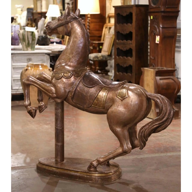 This striking antique carousel horse was crafted in France circa 1880 and captures the theatrical spirit of the Belle...