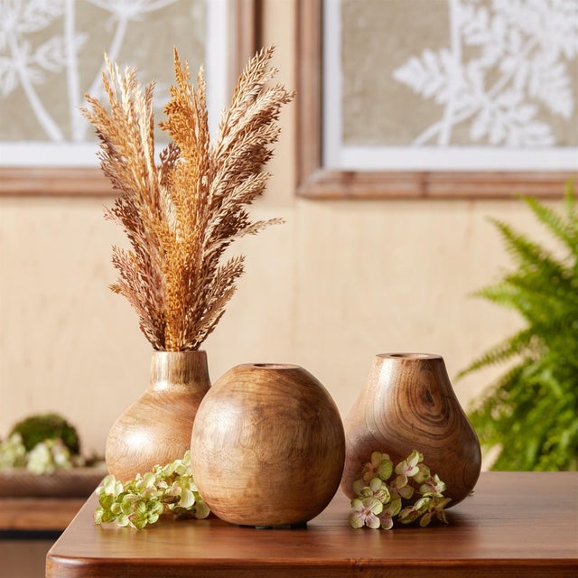 Elevate your home decor with this charming Natural Wood Bud Vase Set. Crafted from solid wood and finished with a...