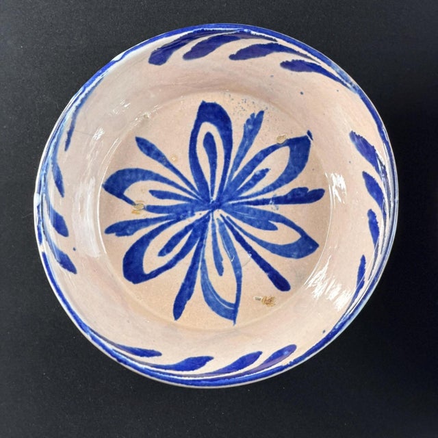 Authentic set of three 19th-century Fajalauza deep bowls from Granada, Andalusia. Each bowl is hand-painted in cobalt blue...