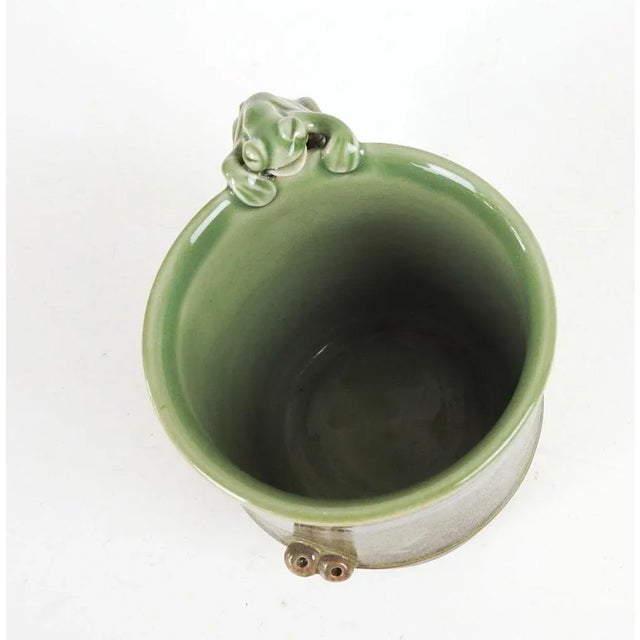2018 porcelain pottery mug in olive green by Texas artist Vorakit Chinookoswong. Highly regarded ceramic artist, whose...