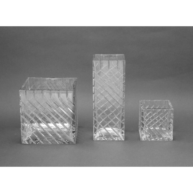 Set of Three Baccarat Crystal "Kalimnos" Vases, comprising: two square and one rectangular, each acid-etched mark to...
