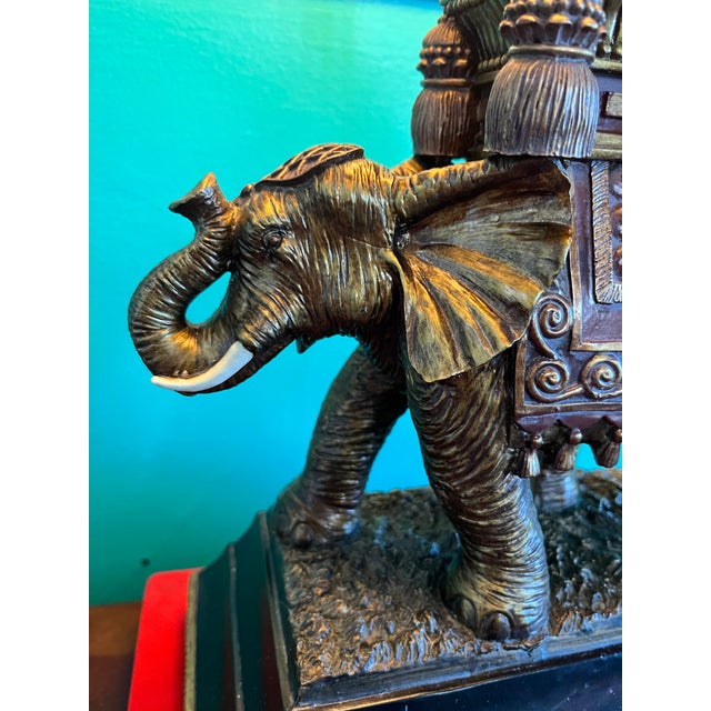 Attributed to Robert Abbey, this Asian-inspired elephant table lamp exemplifies the bold elegance of Hollywood Regency...