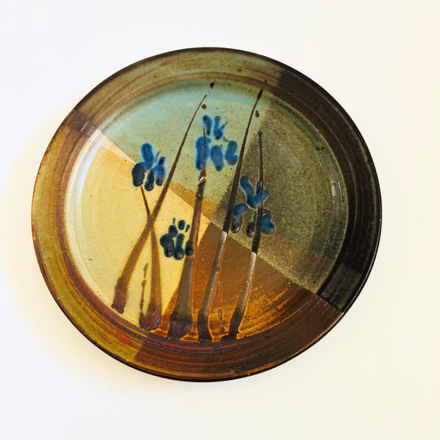 A vintage studio pottery plate by ceramicist Bill Creitz of Oregon (born 1907). Versatile large size for serving a variety...