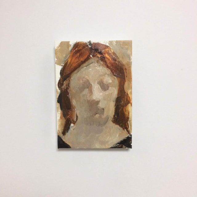This oil on canvas work presents a figure with a softly rendered face, characterized by muted tones and a gentle...