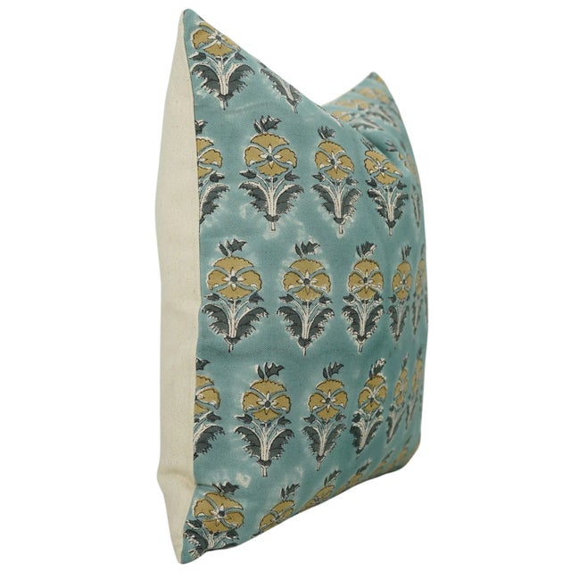 Inspired by the regal beauty of a peacock’s crown, the Mor Mukut cushion cover features an intricate hand block printed...
