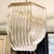 1980s Vintage Hollywood Regency Gold Lucite Ribbon Loop Carlo Nason Style Lucite Chandelier For Sale - Image 5 of 7