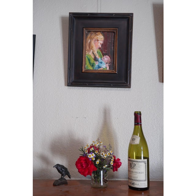 This intimate oil painting captures a tender moment between a mother and her child, showcasing a deep emotional...