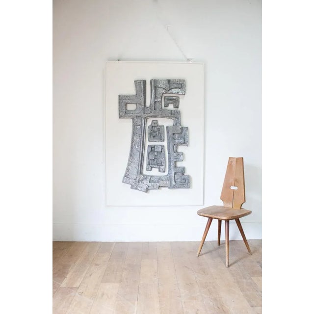 An early 1950s Abstract Wall Sculpture in cast alloy by G.B Dunn. This extremely well designed and executed Abstract work...