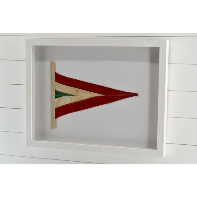 Vintage boat pennant. Framed in our own frame shop with all wood shadow box frame with acrylic not glass
