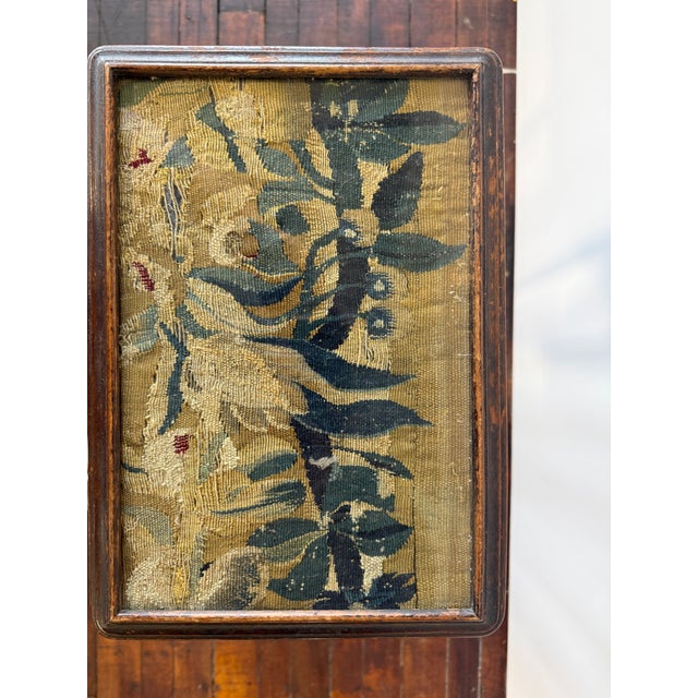 A good quality Queen Anne style occasional table with a fixed rectangular tapestry top set beneath glass. The table is...
