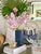 Elevate your space with the effortless sophistication of the Azure Palm Orchid Arrangement - a striking composition...