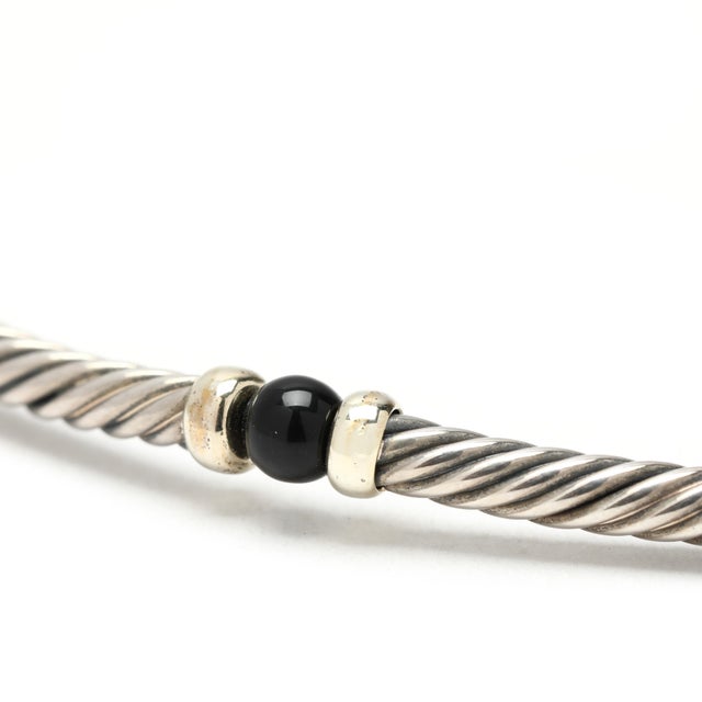 Length: 15 in. Cable Width: 3 mm Weight: 12.9 dwts. / 20.1 grams Stamps: "DY 925 585" SKU: N1156 A Couple Of Things to...